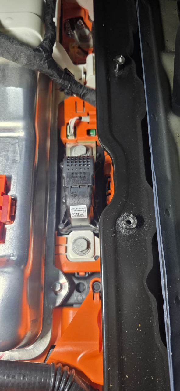 Tesla Model 3 BMS connector closeup in battery penthouse