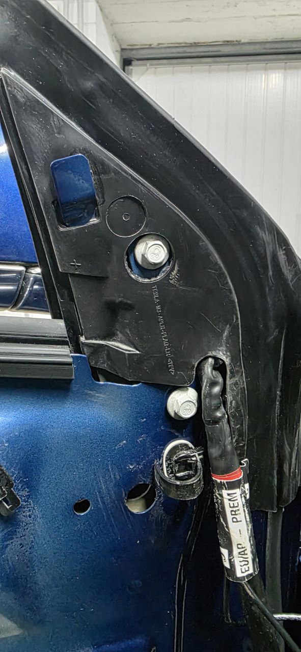 Door mounting area with mirror removed