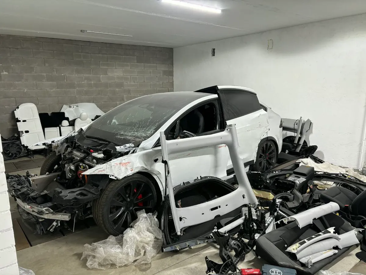 Tesla Model Y complete teardown in workshop